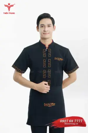 Trước đồng phục phục vụ nhà hàng TTNHAPVM21 màu đen phối cam