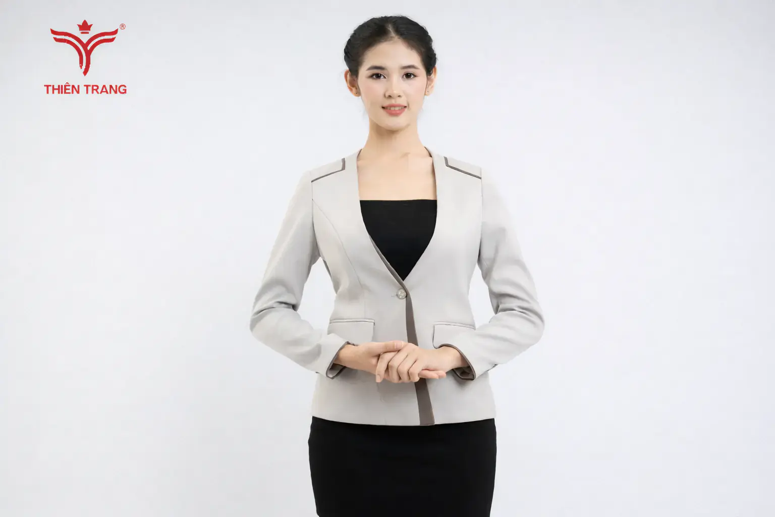 Top mẫu đồng phục spa mùa đông sang trọng nhất 3 Váy đen phối Vest vải nỉ xám là bộ đồng phục mùa đông spa đẹp nhất
