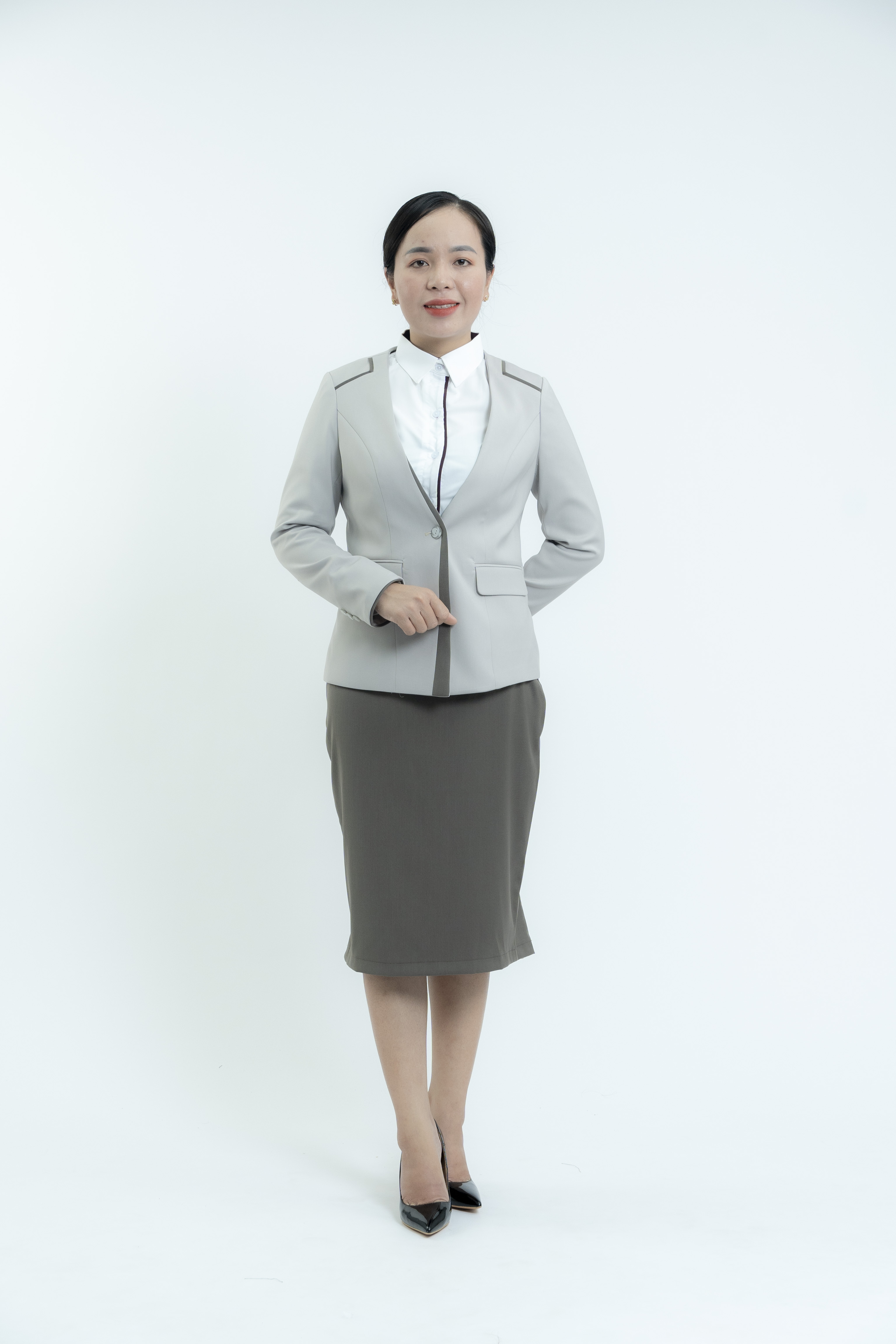 Đồng phục Vest phối váy xám là mẫu đồng phục spa mùa đông Đồng Phục Thiên Trang được ưa chuộng nhất